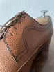 /bilder/schuh-dokumentation/brogues/braune-austerity-brogues-gepraegtes-leder/austerity-brogue-seite/sub/braune-austerity-brogues-gepraegtes-leder-schaftraender-schraeg-vorne.avif