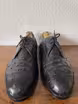 /bilder/schuh-dokumentation/spitzderbies/schwarze-straussenleder-spitzderbies/sub/schwarze-straussenleder-spitzderbies-vorne.avif